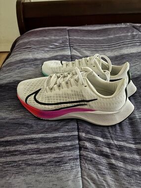 Nike Women’s White Running Shoes with Black Swoosh and Pink Gradient